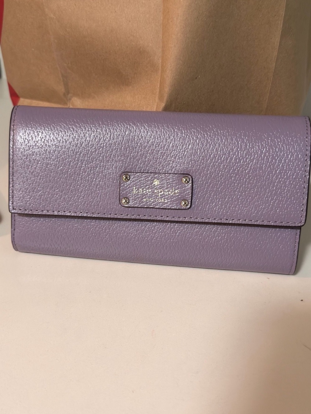 kate spade lilac pebbled leather continental wallet
